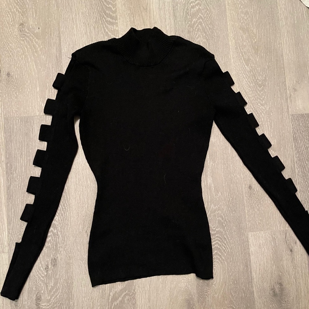 Black banded sleeve turtle neck